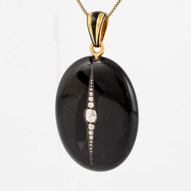 Medallion, 18K gold, onyx, black enamel, and old-cut diamonds, late 19th century.
