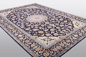 A carpet, Kashan, ca 411 x 284 cm.