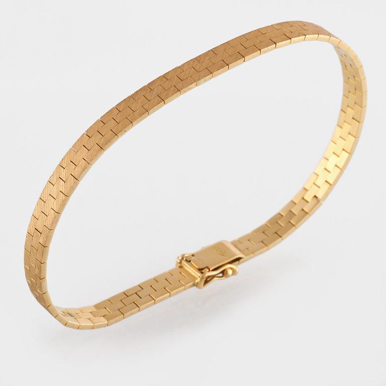 ARMLÄNK, 18K guld, importstämplad. Vikt 16,3 gram.