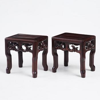 A pair of hardwood pidestals, China, early 20th Century.