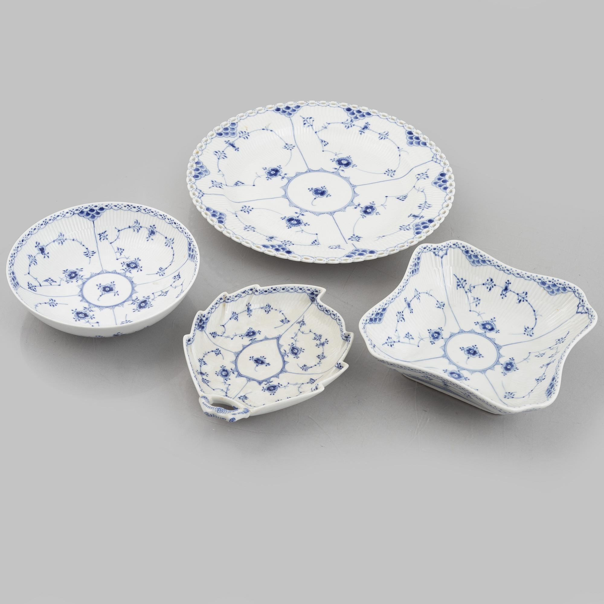 Royal Copenhagen, a 116-piece 'blue Fluted' porcelain dinner and coffee service, half lace, Denmark, mostly 1923-34.