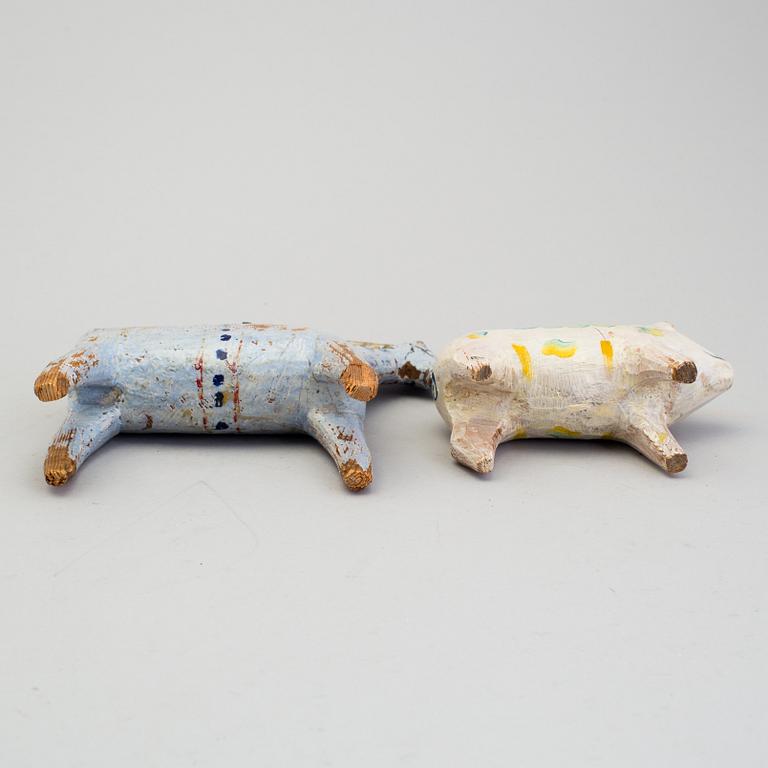 A painted folk art dala horse and dala pig, first half of the 20th century.