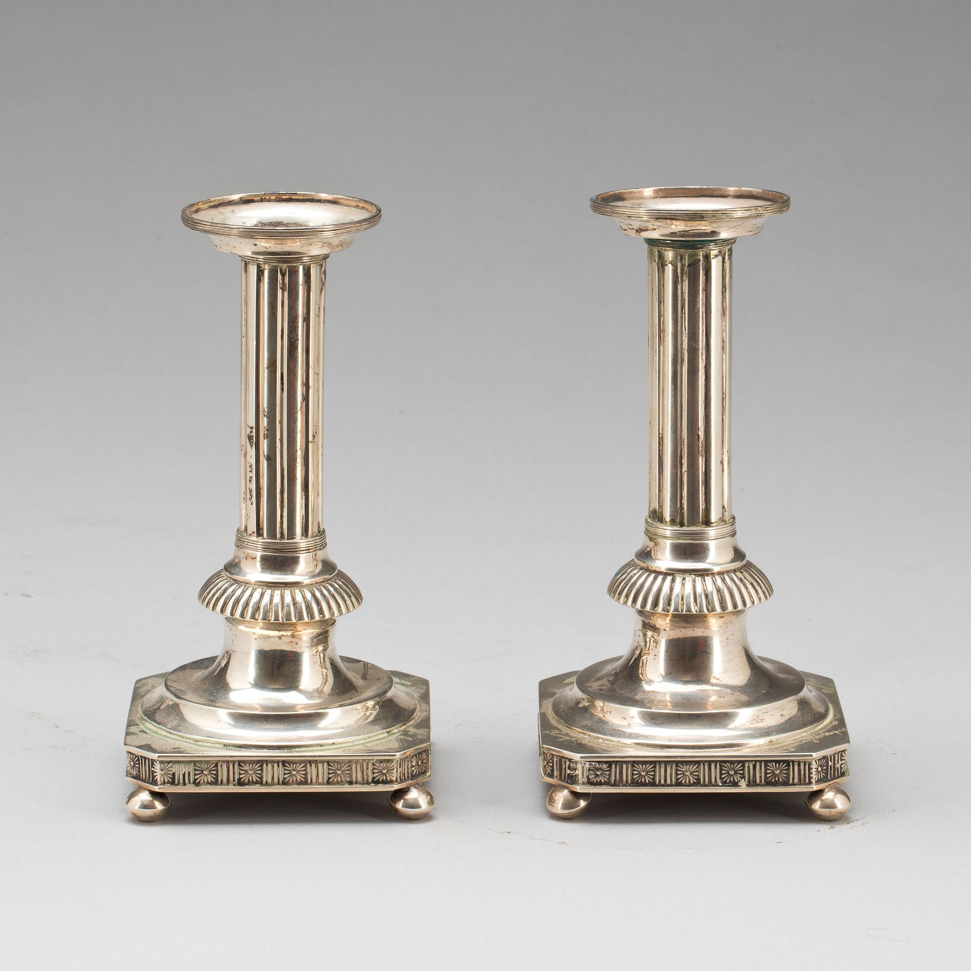 LJUSSTAKAR, ett par, silver. Bernt Erlandsson(1867-1917).  Kristianstad, 1905. Ca 420 gram.