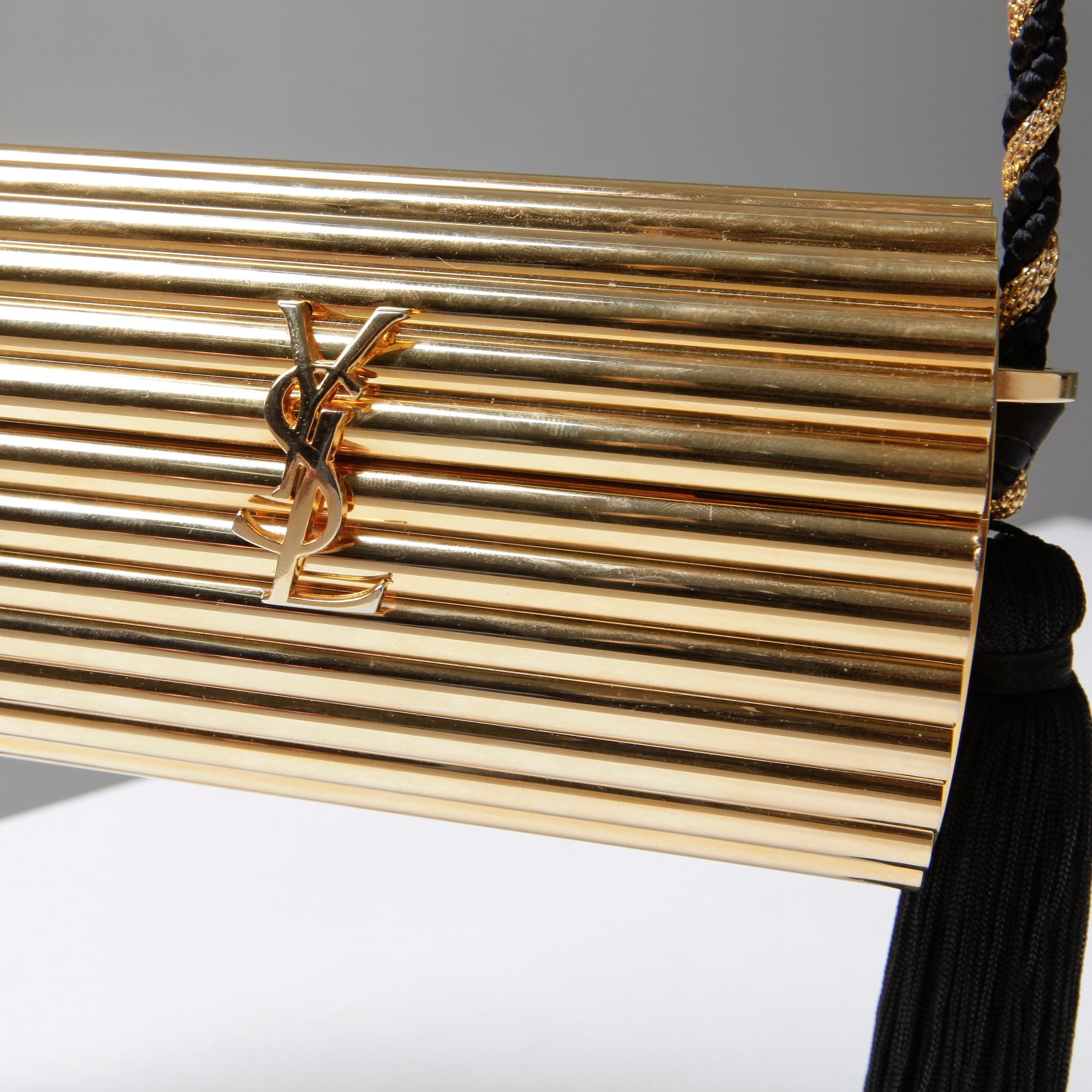 AFTONVÄSKA, "Gold Tassel Clutch", Yves Saint Laurent.