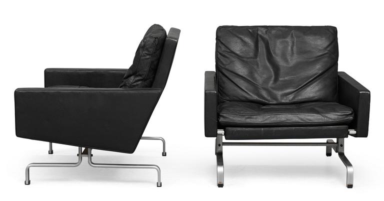 A pair of Poul Kjaerholm 'pk-31' black leather easy chairs for E Kold Christensen, Denmark, maker's mark in the steel.