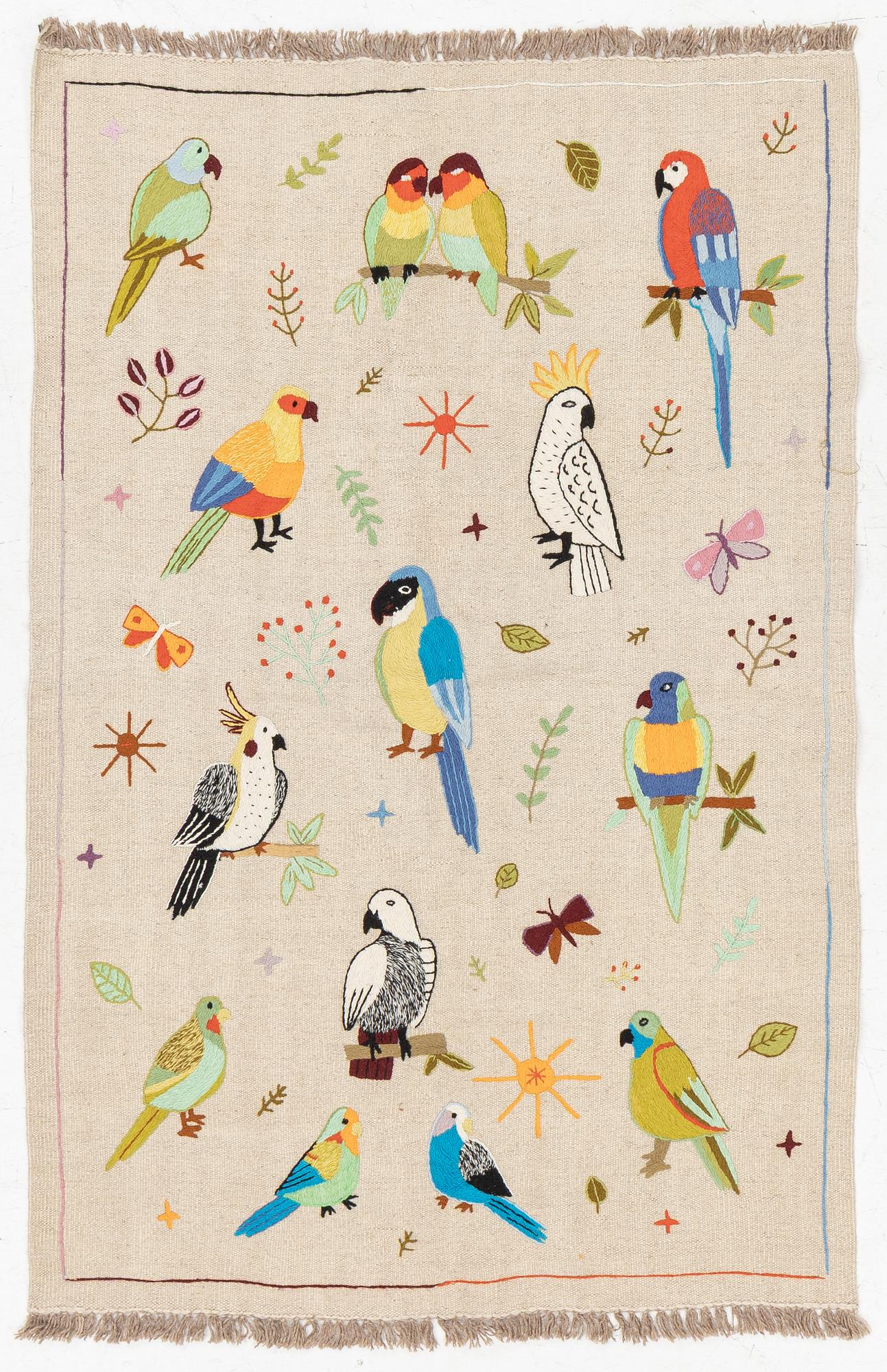 A hand-embroidered Kelim rug, 180 x 118 cm.