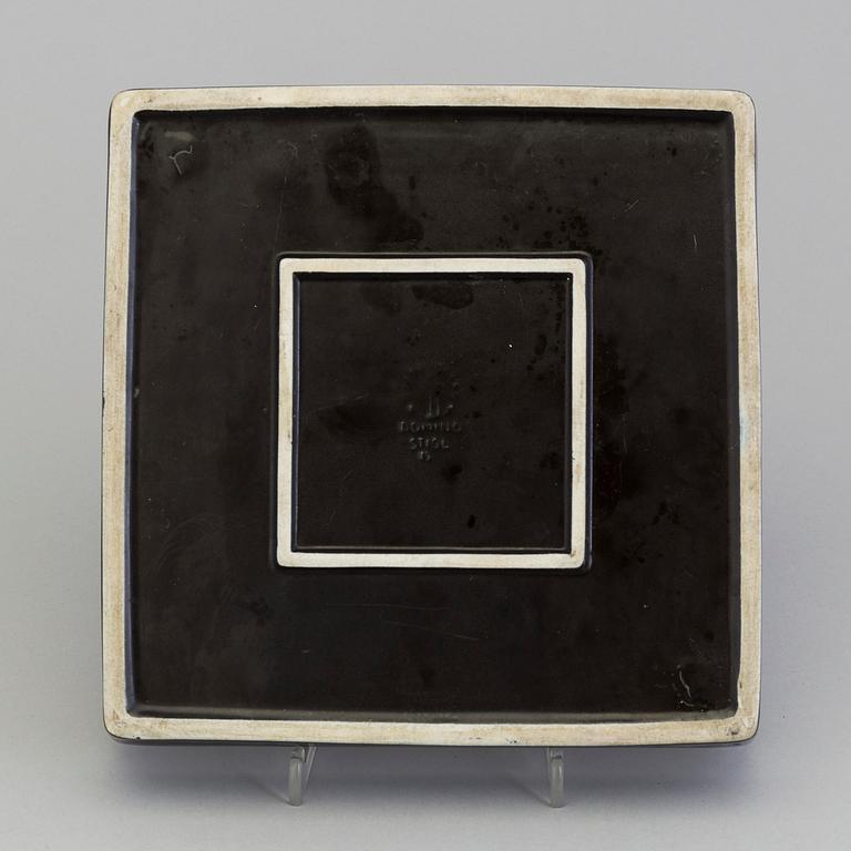 A stoneware plate by Stig Lindberg for Gustavsberg, model "Domino", 1955-69.