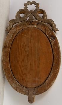 A pair of late Gustavian one-branch giltwood girandole mirrors, Stockholm, circa 1800.