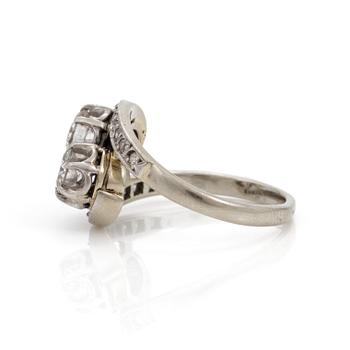 A cross-over ring set with old and eight-cut diamonds.