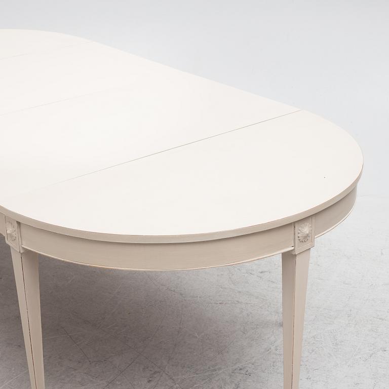 A Gustavian style dining table, mid-20th Century.