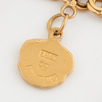 Bracelet, with charms, 18K gold.