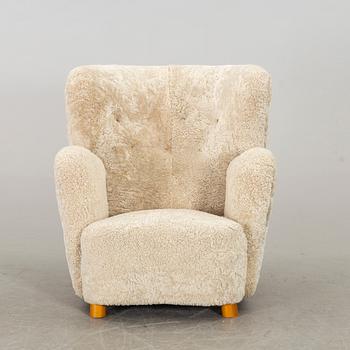 A DANISH SHEEPSKIN ARMCHAIR, 1940-50's.