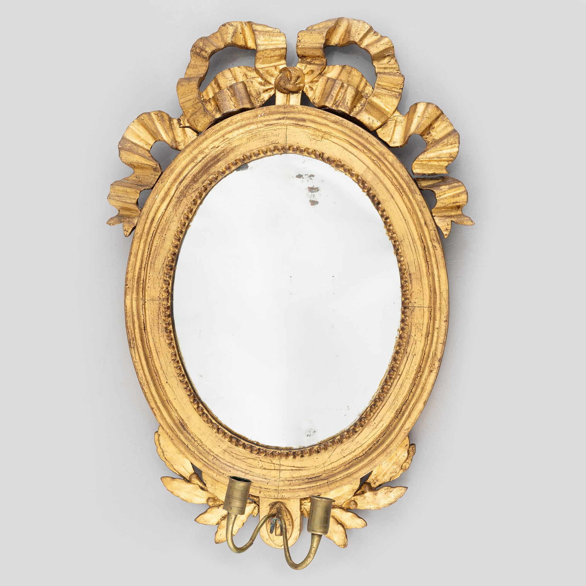 A Gustavian mirror wall sconce, late 18th Century.