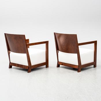 A pair of second half of the 20th century easy chairs.