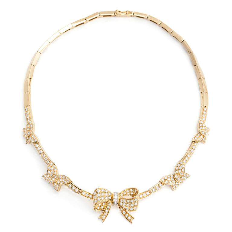 An 18K gold necklace, with brilliant- and baguette-cut diamonds totaling approx. 4.44 ct.