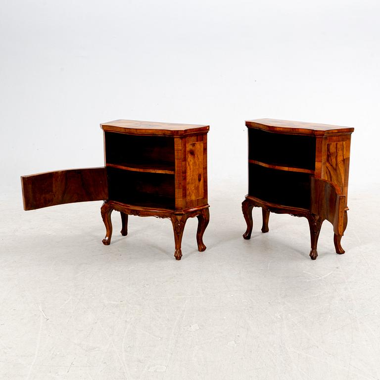 A pair of walnut veneered bedside tables from the second half ot the 20th century.