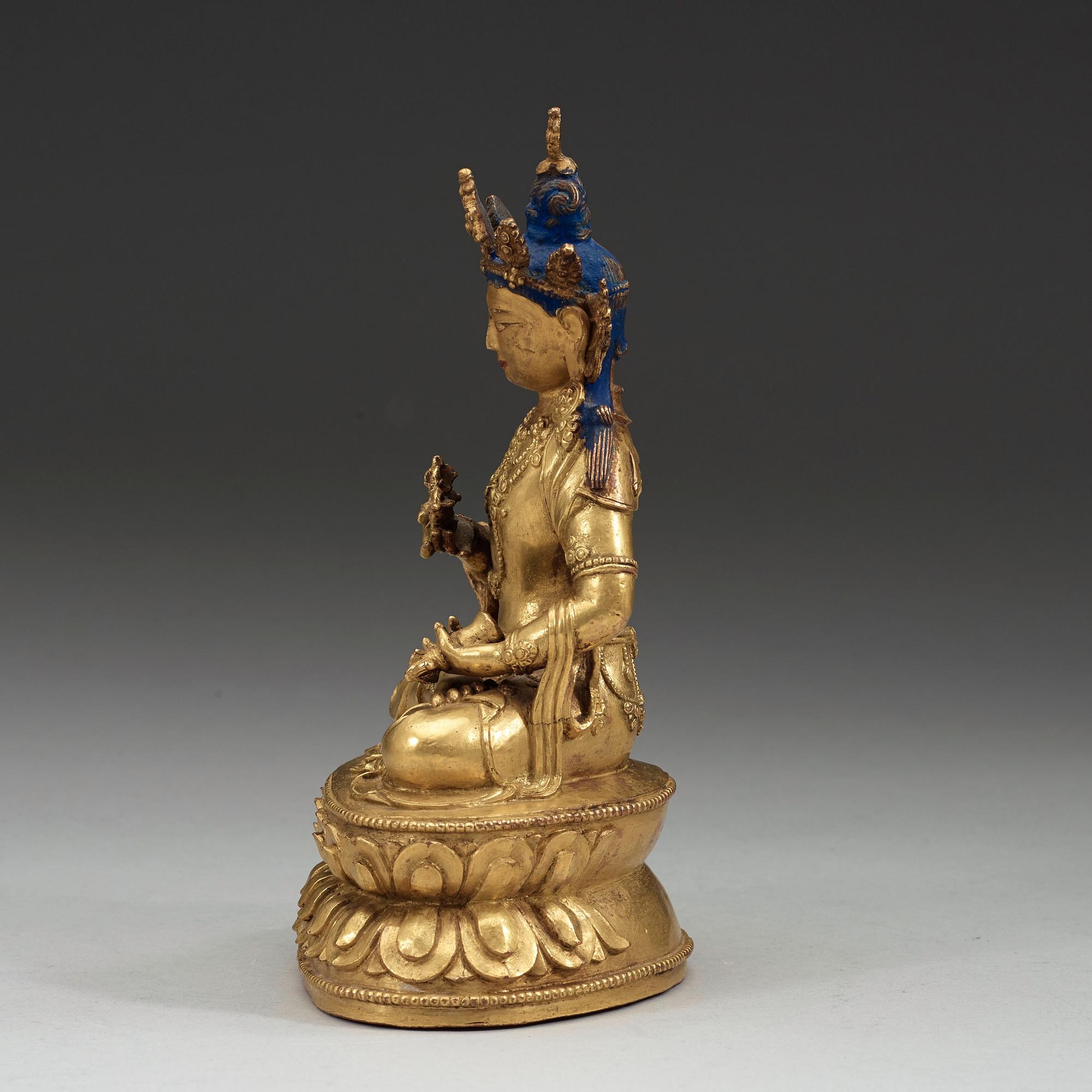 FIGURIN, delvis förgylld och bemålad brons. Vajrasattva, Tibet, 1700-tal.