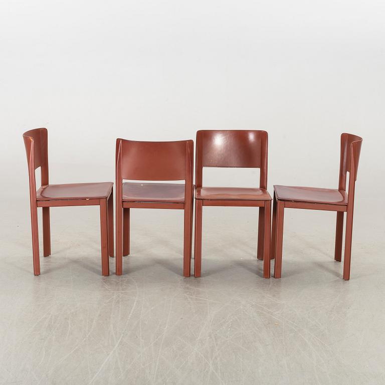MATTEO GRASSI, a set of four leather chairs.