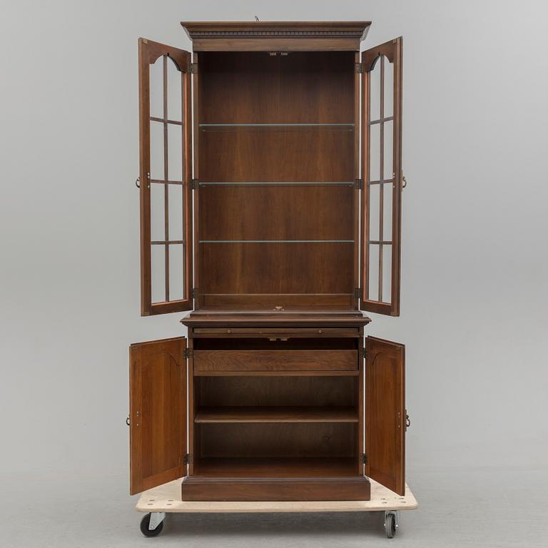 A second half of the 20th century vitrine cabinet marked "Pennsylvania House".