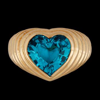 43. A heart cut blue topas ring.
