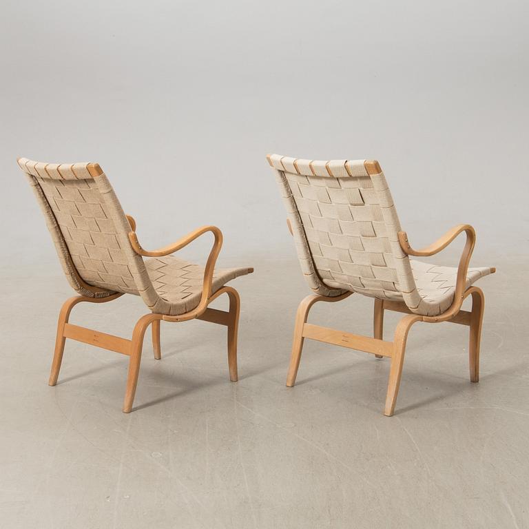 Bruno Mathsson, a pair of "Eva" armchairs, Bruno Mathsson Company, Värnamo, late 20th century.