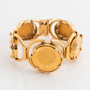 An 18K gold bracelet set with Mexican 22K gold coins.