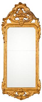 560. A Swedish Rococo mirror by N. Meunier.