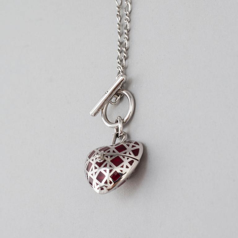 A Christian Dior costume jewelry pendant.