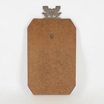 A Swedish pewter mirror, 1934.