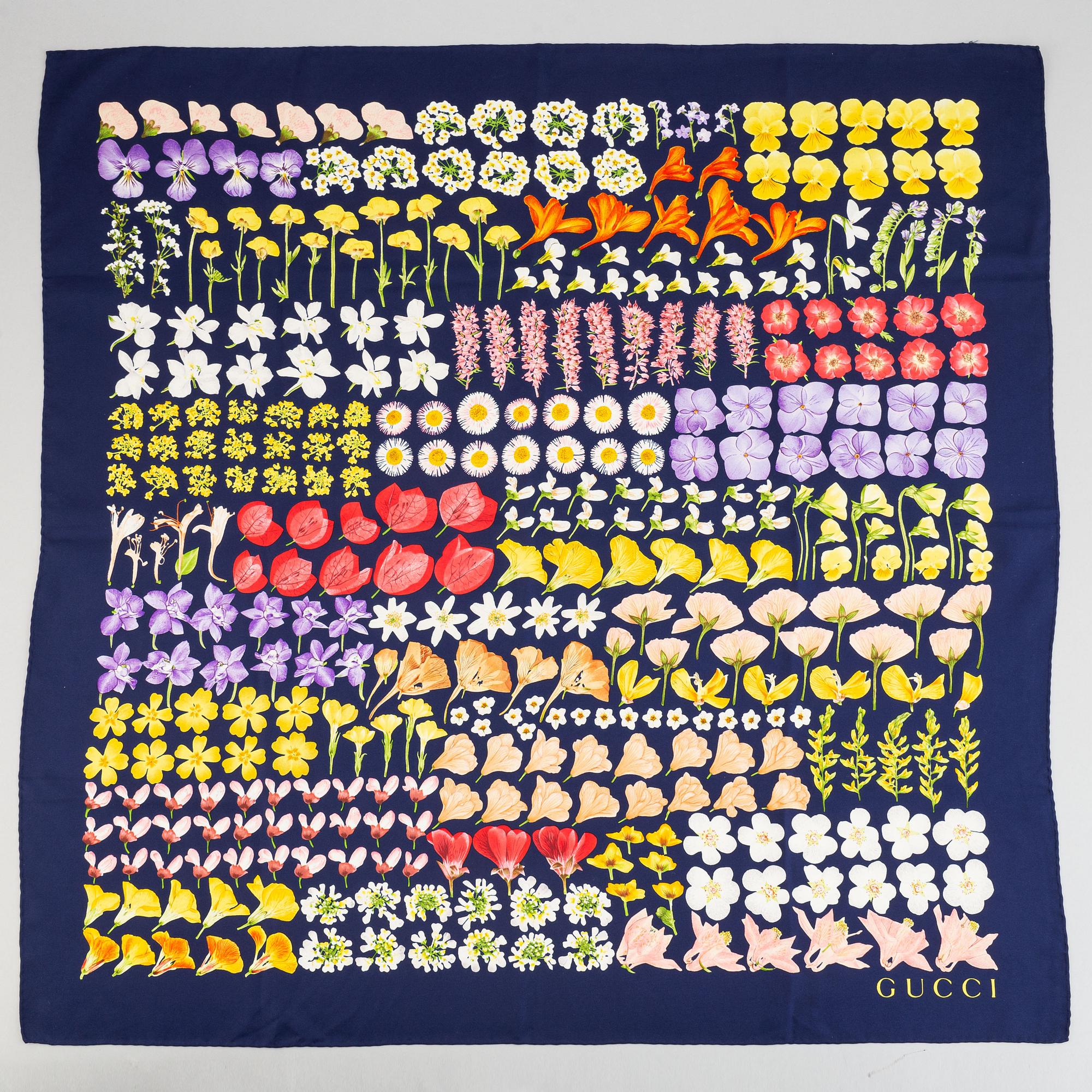 Gucci, a silk scarf.