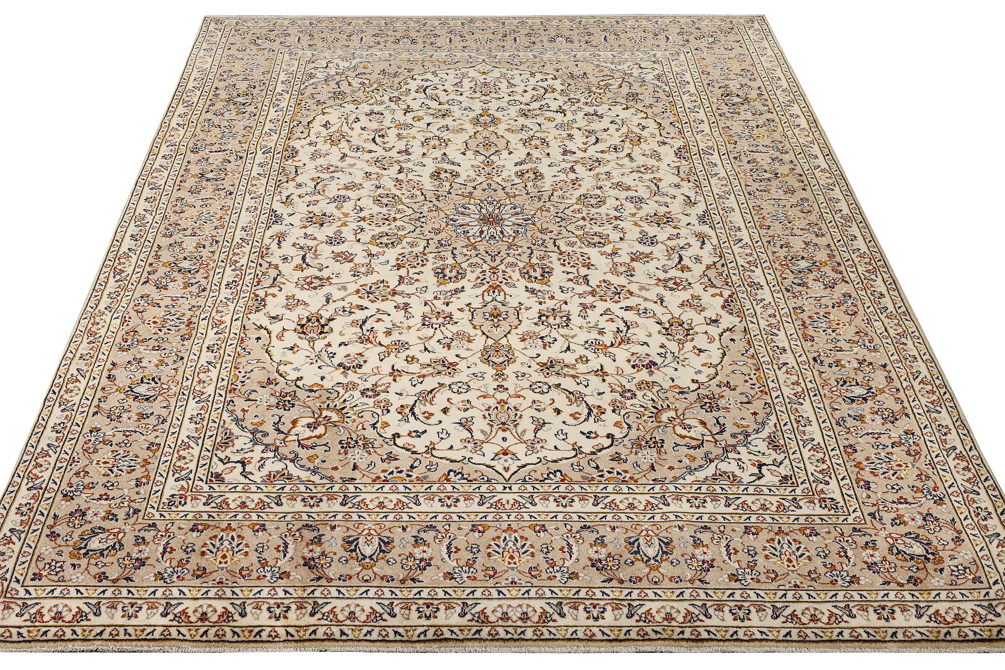A Keshan carpet, c. 355 x 240 cm.