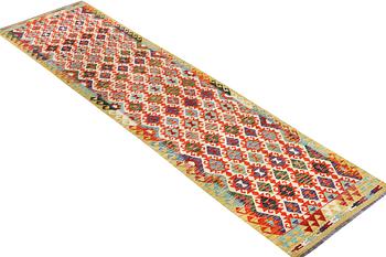 A Kilim runner carpet, c. 406 x 87 cm.