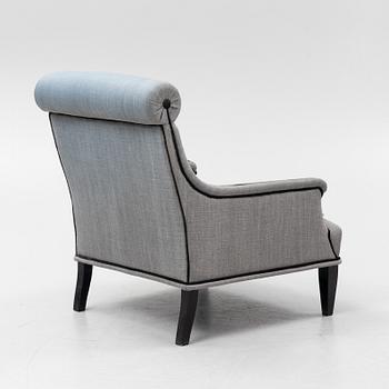 A contemporary easy chair.