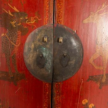 A 20th century Chinese painted wooden cabinet.