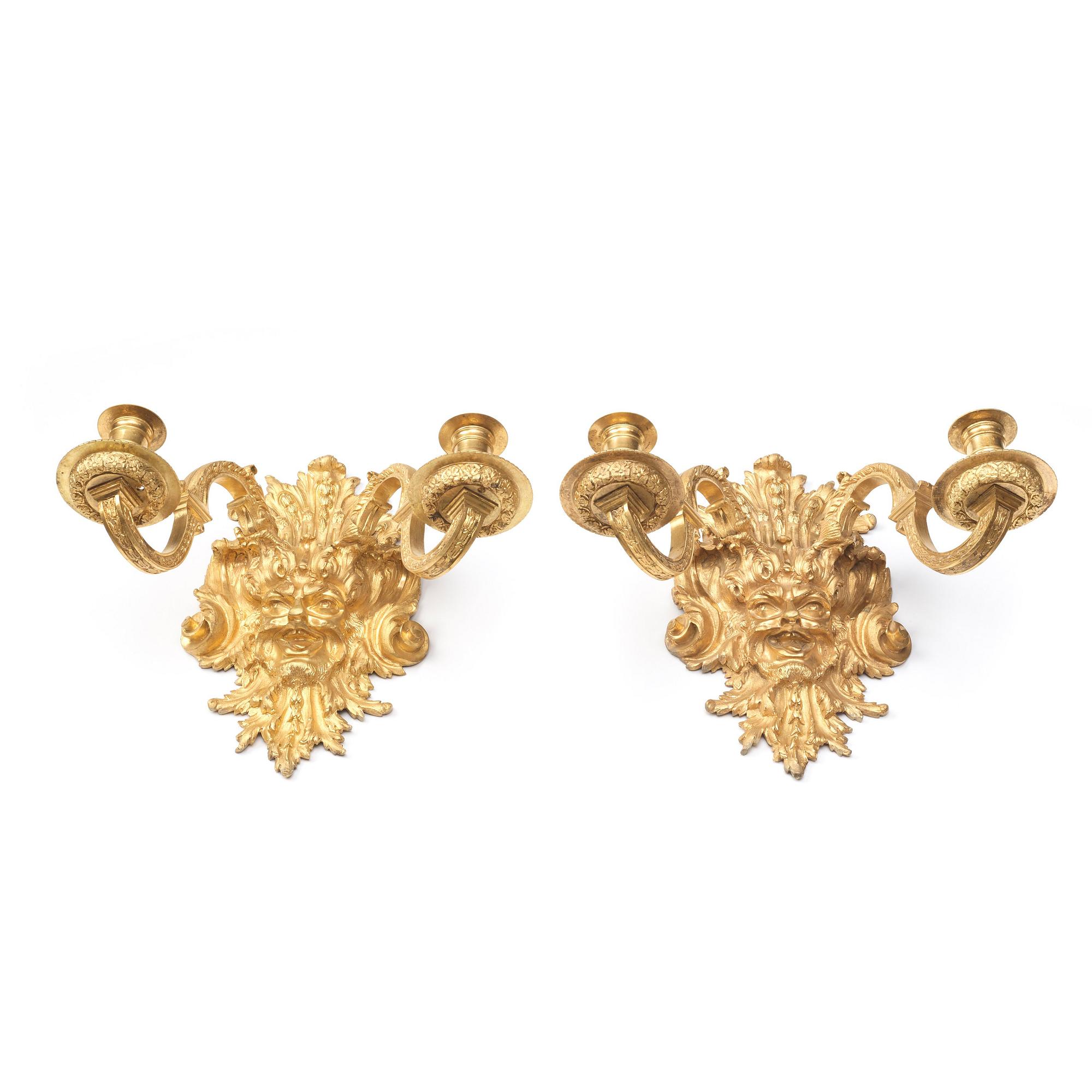 A pair of Baroque-style mid 19th century two-light wall-lights.