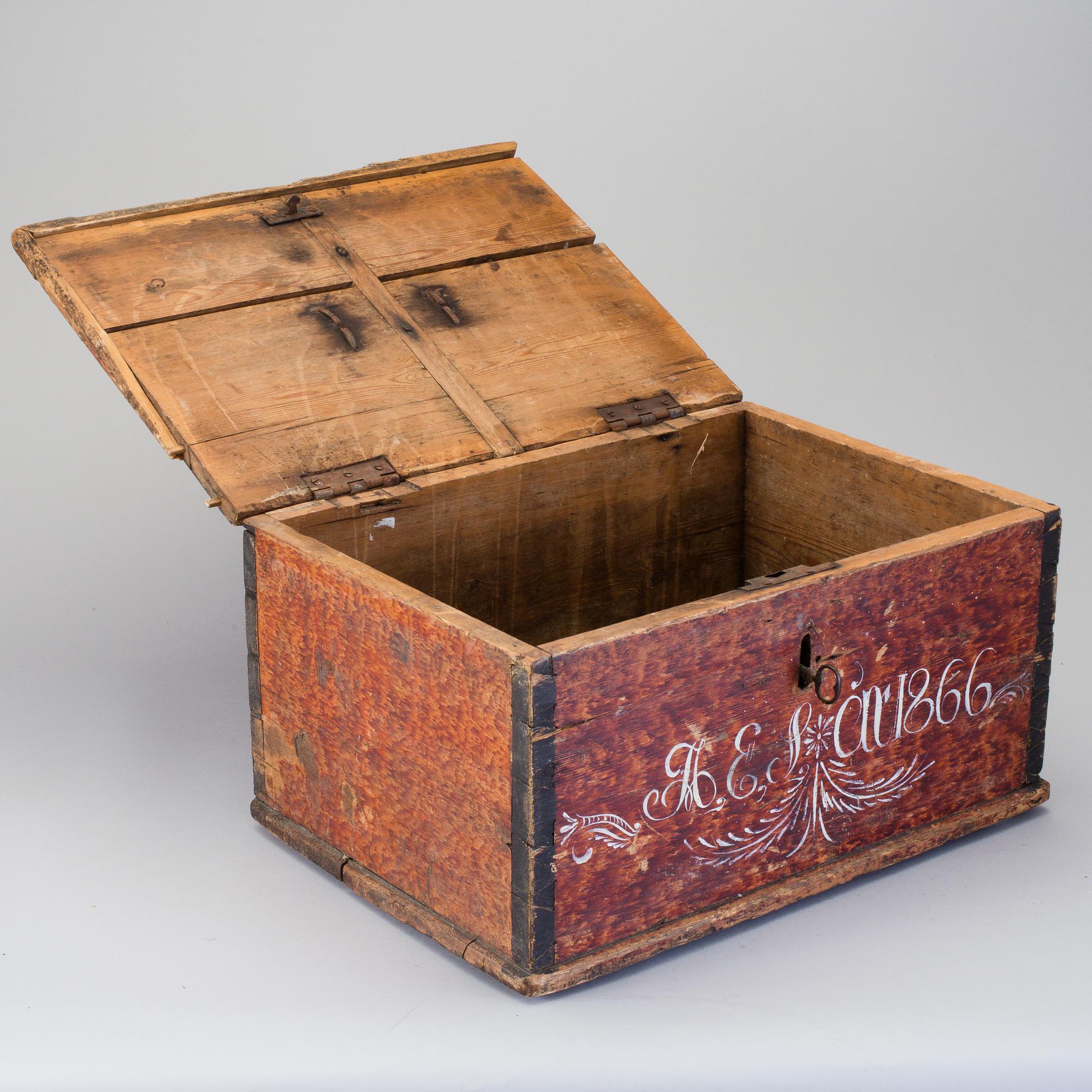 A folk wood box dated 1866.