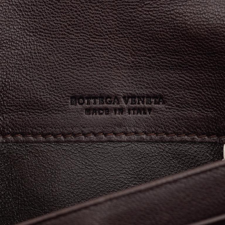 Bottega Veneta, a brown leather wallet.