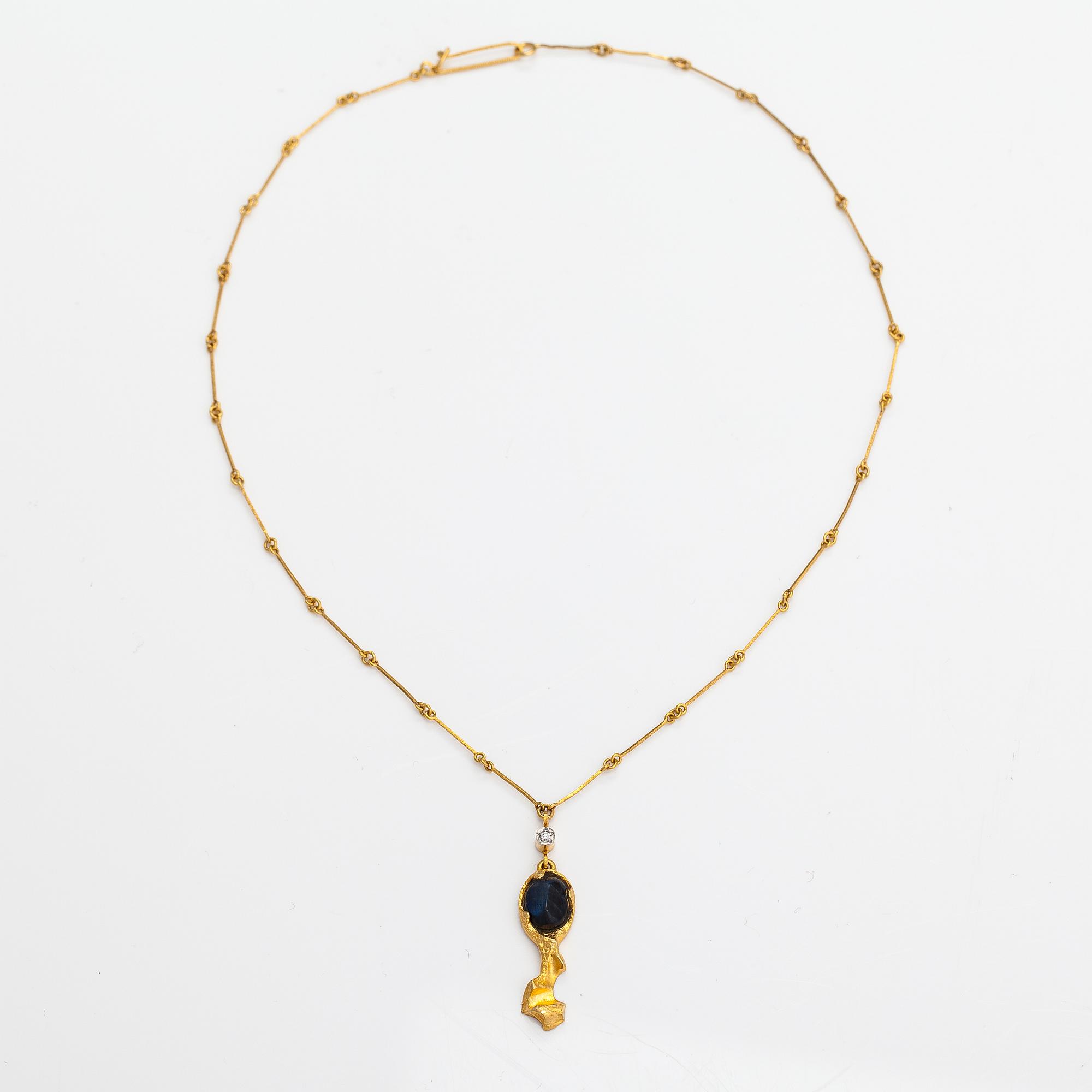 Björn Weckström, Halsband "Hindam", 18K guld, spektrolit och 8/8-slipad diamant ca 0.02 ct. Lapponia 1975.