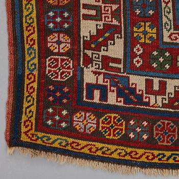 A RUG, a semi-antique Gendje probably, ca 209 x 124 cm.