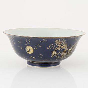 A Chinese bowl decorated with five clawed dragons, Qing dynasty with Qianlong mark.