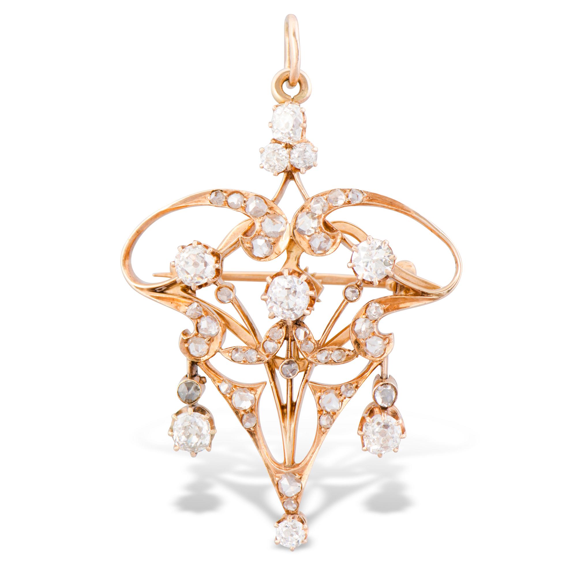 A BROOCH / PENDANT, old cut diamonds, 14K (56) gold. Russia, early 20th century.