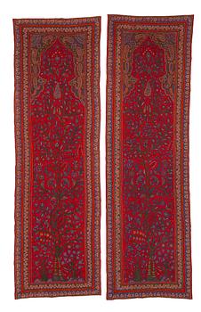 230. A pair of semi-antique Pateh Kerman embroideries, ca 279 x 88 cm and 282 x 84 cm.