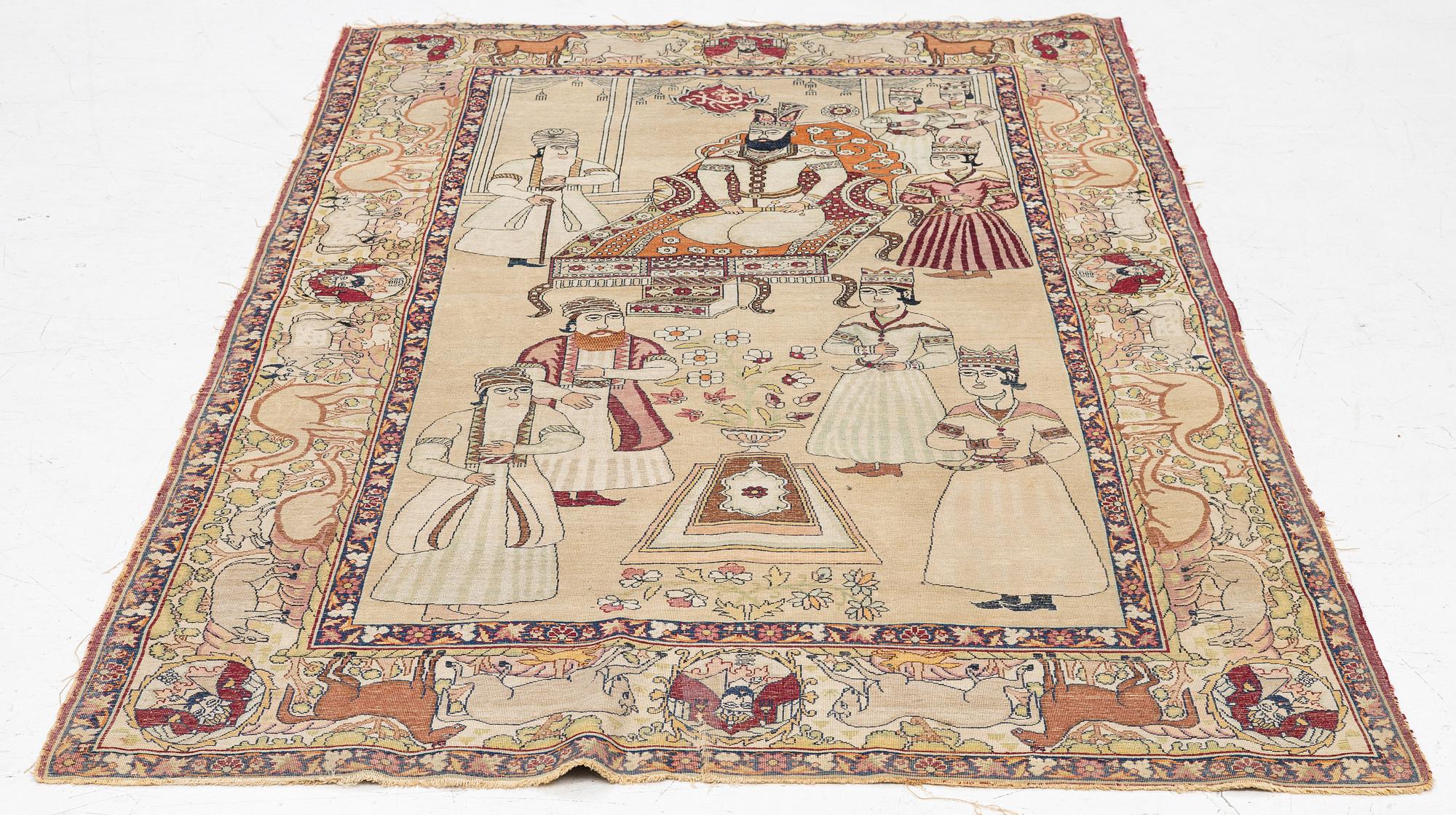 An antique Kerman Laver rug, South Persia, signed c.206 x 133 cm.