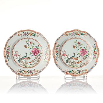 A set of six famille rose 'double peacock' dishes, Qing dynasty, Qianlong (1736-95).