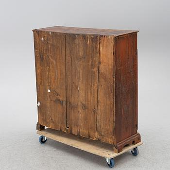 A 19th century cabinet.
