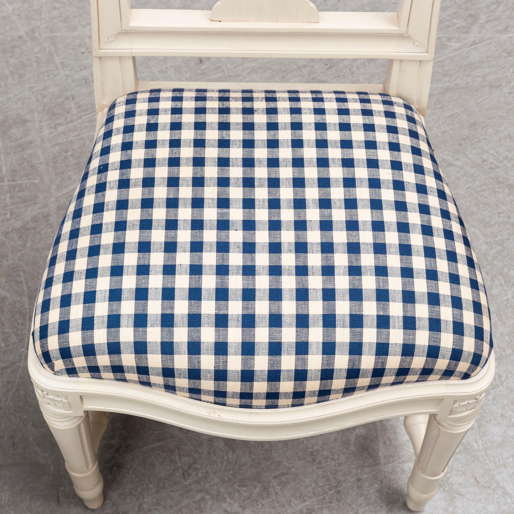 Four Swedish Gustavian style 'Hallunda' dining chairs from IKEA's 18th century collection.