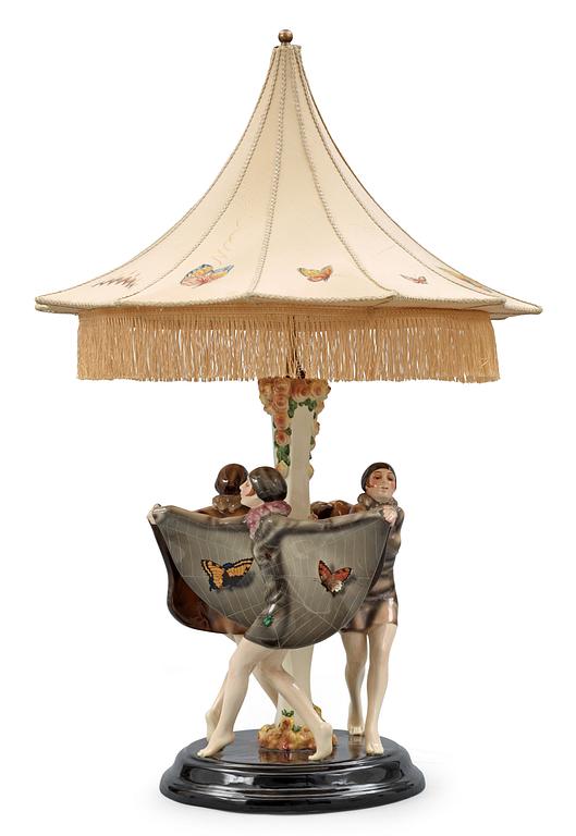 A Josef Lorenzl "The captured bird" triple figural lamp, Goldscheider, Wien circa 1925.