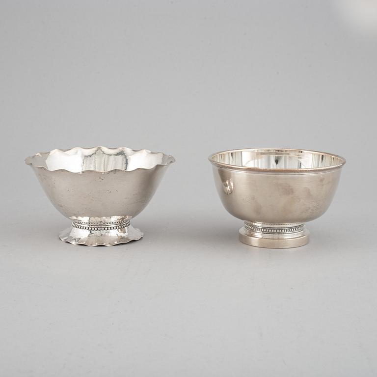 Two silver bows, Stockholm 1924 and 1970.