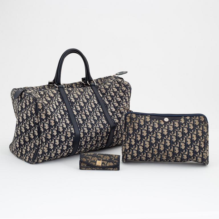 Christian Dior, a canvas handbag, toilet bag and key holder.