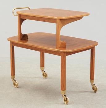 A Josef Frank walnut and mahogany serving trolley, Svenskt Tenn, probably 1950's.